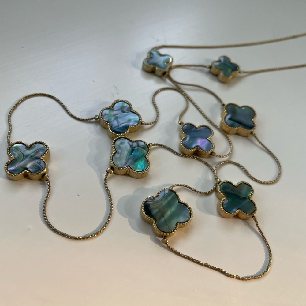 36 inch grey/blue/green 9 motif clover necklace